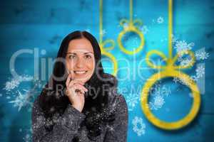 Composite image of woman smiling at the camera