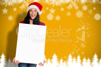 Composite image of woman holding a white sign