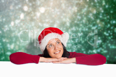 Composite image of woman smiling while looking away