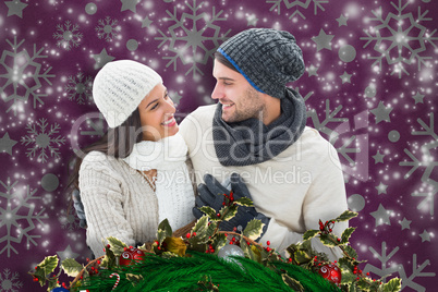 Composite image of young winter couple