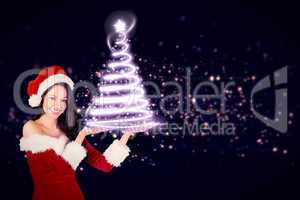 Composite image of pretty girl presenting in santa outfit