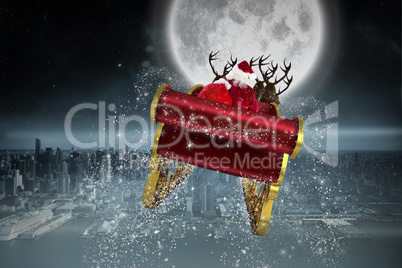 Composite image of santa flying his sleigh