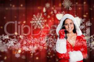 Composite image of woman wearing sexy christmas clothes