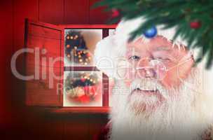 Composite image of santa claus winking