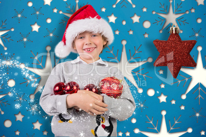 Composite image of festive boy smiling