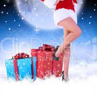 Composite image of festive womans legs in high heels