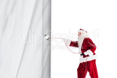 Santa claus pulling a rope