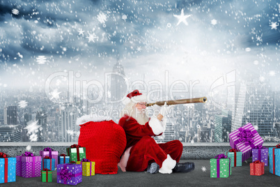 Composite image of santa looking through a telescope