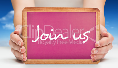 Composite image of females hands showing pink board