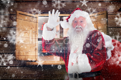 Composite image of santa claus waving Composite image of santa claus waving