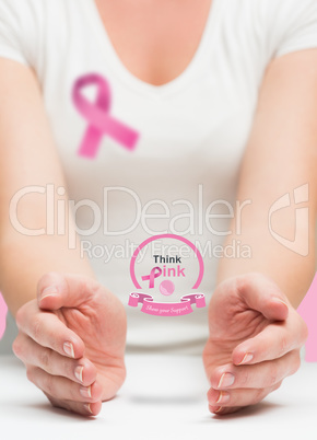 Woman presenting breast cancer awareness message