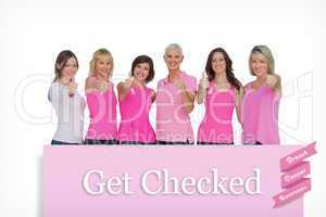 Composite image of positive women posing with pink top for breas