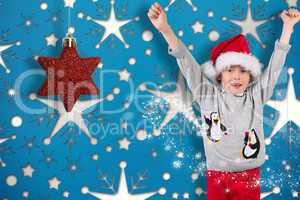 Composite image of festive boy cheering