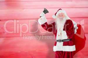 Composite image of santa claus ringing bell