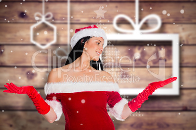 Composite image of woman smiling with hands raised