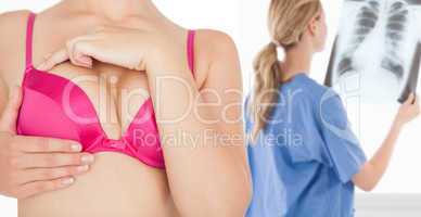Clloseup of woman performing self breast examination