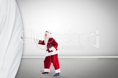 Santa pulls curtain with a rope