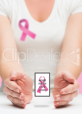 Woman presenting breast cancer awareness message