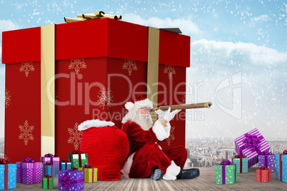 Composite image of santa looking through a telescope