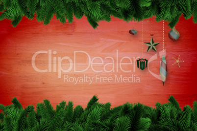 Composite image of fir tree branches forming frame