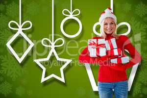 Composite image of happy festive blonde with gift