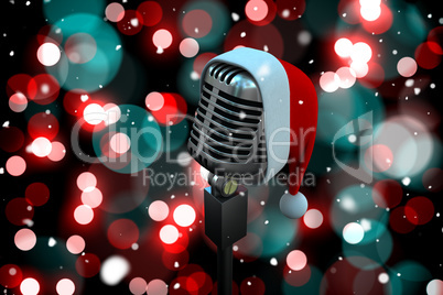 Composite image of microphone with santa hat