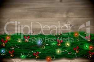 Composite image of fir branch christmas decoration garland