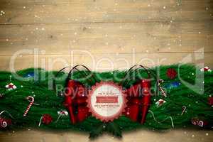 Composite image of fir branch christmas decoration garland