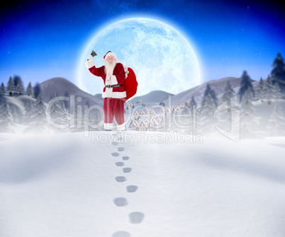 Composite image of santa walking in the snow