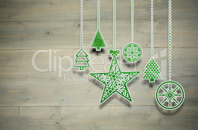 Composite image of hanging christmas decorations