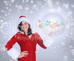 Composite image of pretty girl presenting in santa outfit