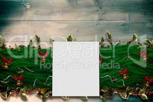 Composite image of fir branch christmas decoration garland