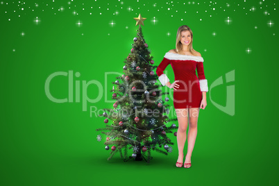 Composite image of pretty girl smiling in santa outfit