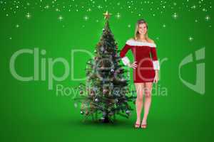 Composite image of pretty girl smiling in santa outfit