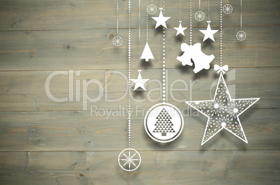 Composite image of hanging christmas decorations