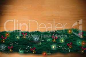 Composite image of fir branch christmas decoration garland