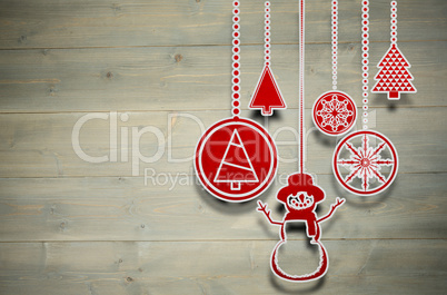 Composite image of hanging christmas decorations