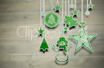 Composite image of hanging christmas decorations