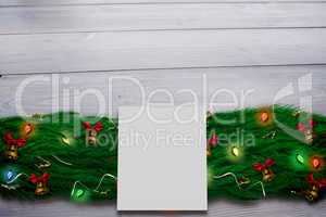 Composite image of fir branch christmas decoration garland