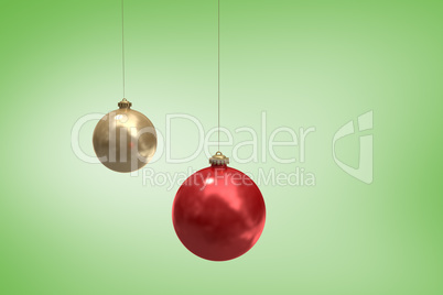 Composite image of digitally generated hanging christmas baubles
