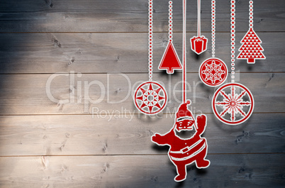 Composite image of hanging christmas decorations