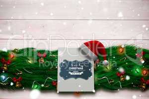 Composite image of fir branch christmas decoration garland