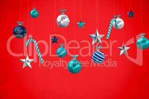 Composite image of digitally generated hanging christmas decorat