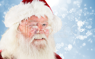 Composite image of santa claus winking