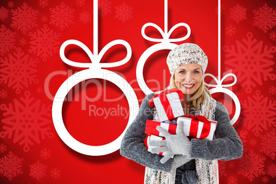 Composite image of happy blonde with gifts