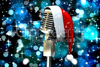 Composite image of microphone with santa hat