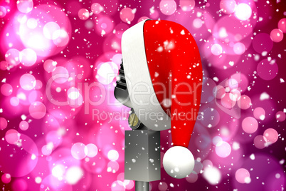 Composite image of microphone with santa hat