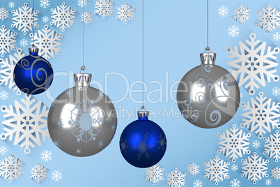 Composite image of blue and silver christmas baubles