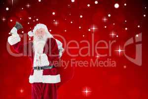 Composite image of santa claus ringing bell