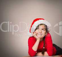 Composite image of festive girl thinking